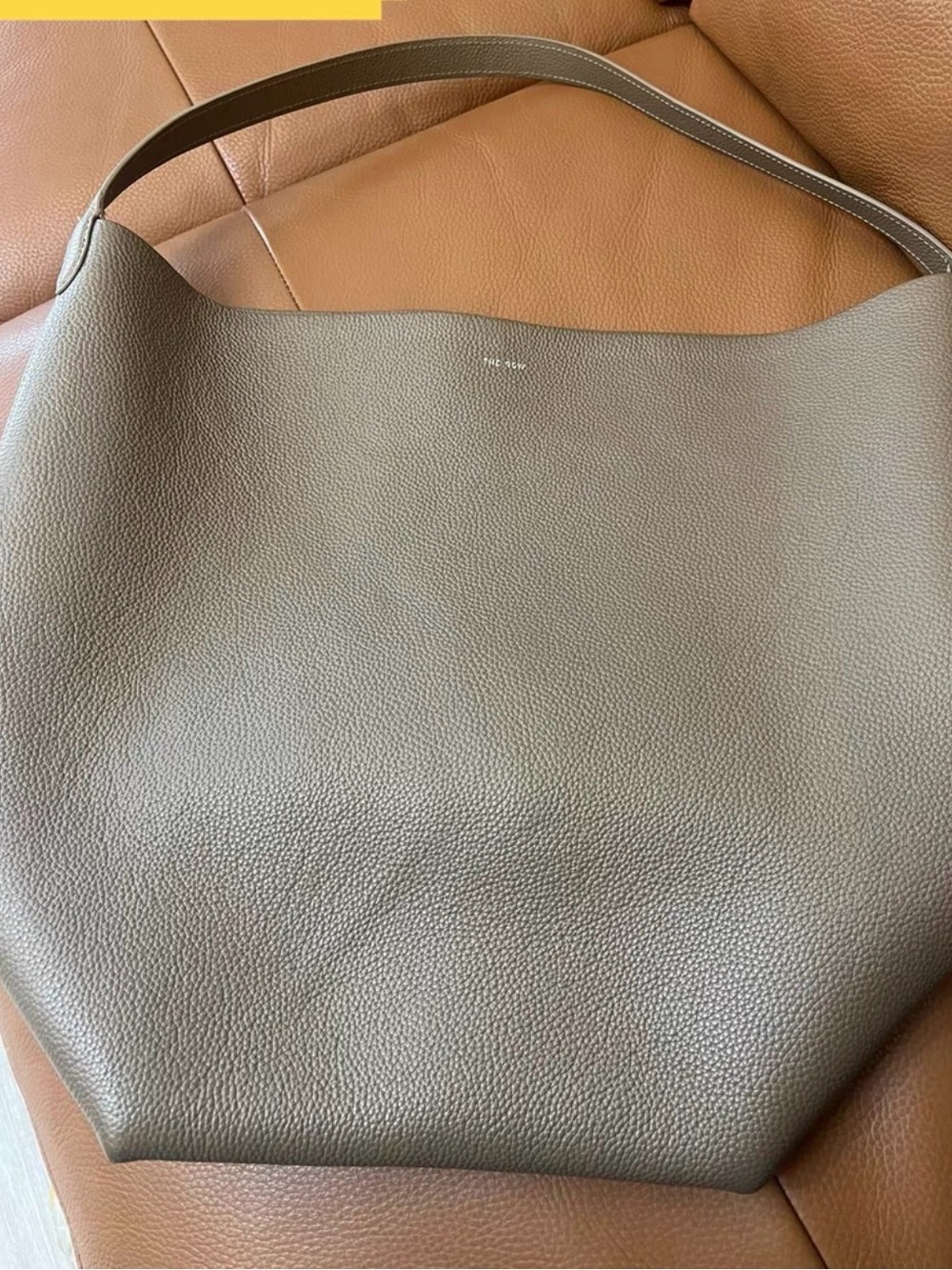 The Row Pebbled Leather Tote in Taupe